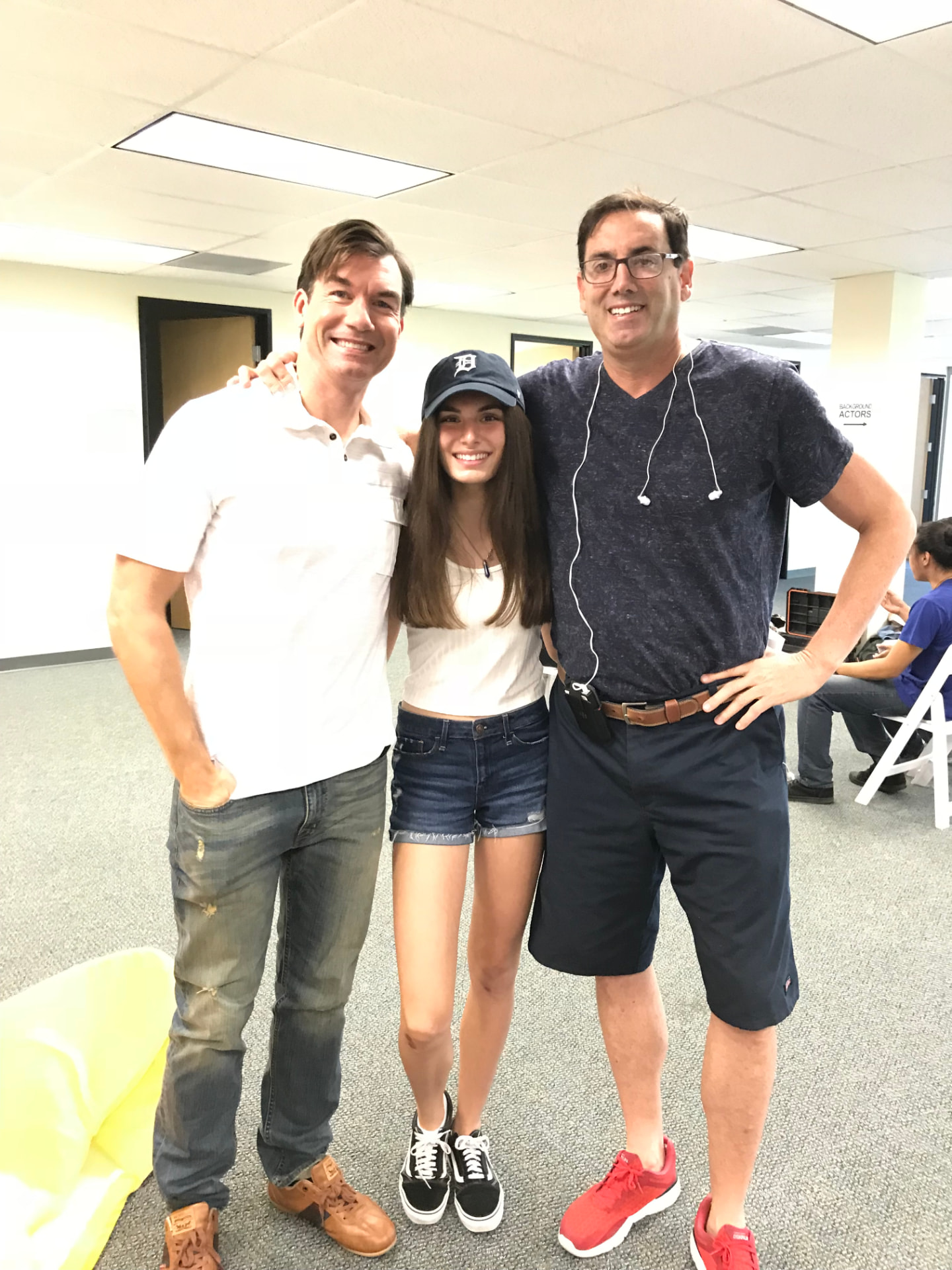 Howard Burd on set with cast members